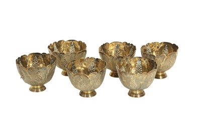 Lot 211 - SIX PARCEL-GILT ZARFS