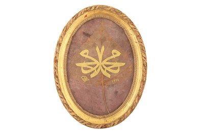 Lot 269 - A CALLIGRAPHIC COMPOSITION IN GOLD ON A NATURAL DRIED OAK LEAF