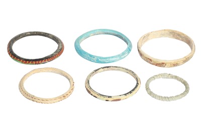 Lot 150 - SIX EARLY ISLAMIC GLASS BANGLES