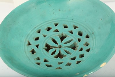 Lot 71 - A SAFAVID TURQUOISE MONOCHROME POTTERY EWER AND BASIN