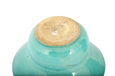Lot 71 - A SAFAVID TURQUOISE MONOCHROME POTTERY EWER AND BASIN
