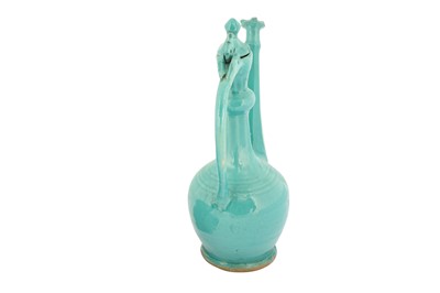 Lot 71 - A SAFAVID TURQUOISE MONOCHROME POTTERY EWER AND BASIN