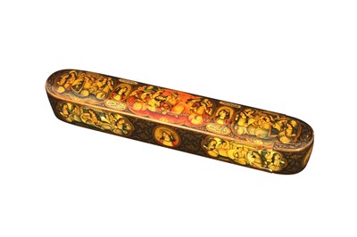 Lot 111 - A LACQUERED PAPIER-MÂCHÉ QALAMDAN WITH BAHRAM AND THE SEVEN PRINCESSES
