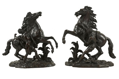 Lot 56 - AFTER GUILLAUME COUSTOU, FRENCH (1677-1746): A PAIR OF LATE 19TH CENTURY CENTURY PATINATED BRONZE MODELS OF THE MARLEY HORSES