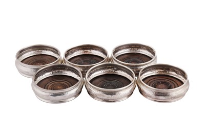 Lot 851 - A SET OF SIX EDWARDIAN STERLING SILVER WHISKEY NOGGIN 'WINE' COASTERS, BIRMINGHAM 1903 BY CORNELIUS DESORMEAUX SAUNDERS & JAMES FRANCIS HOLLINGS SHEPHERD