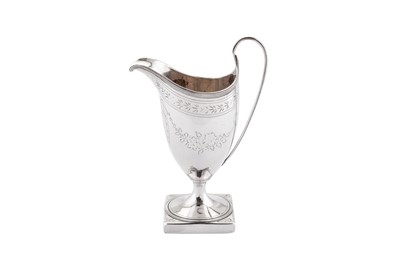 Lot 377 - A George III sterling silver helmet cream jug, London 1792 by Peter and Anne Bateman (reg. 2nd May 1791) overstruck by Thomas Ollivant of Manchester