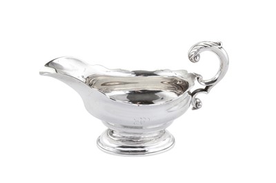 Lot 396 - A George II Scottish sterling silver sauceboat, Edinburgh 1756 by Lothian & Robertson