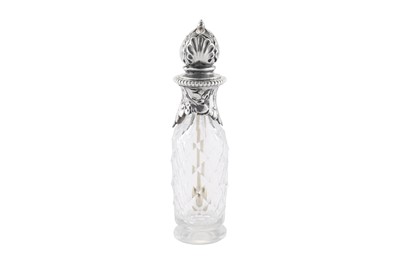 Lot 367 - A Victorian sterling silver mounted cut glass cayenne pepper bottle, London 1865 by Robert Garrard II (reg. 16th April 1818)