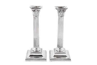 Lot 324 - A pair of Victorian sterling silver candlesticks, Sheffield 1893 by Hawksworth, Eyre & Co Ltd
