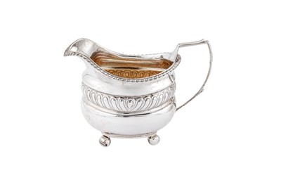 Lot 454 - A George III sterling silver milk jug, London 1816 by Thomas Paine Dexter or Thomas Death