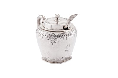 Lot 348 - A Victorian sterling silver mustard pot and spoon, Sheffield 1880 by Henry Wilkinson and Co