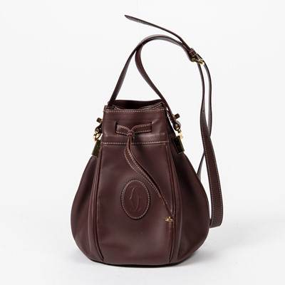 Lot 48 - Cartier Burgundy Must De Cartier Drawstring Tote