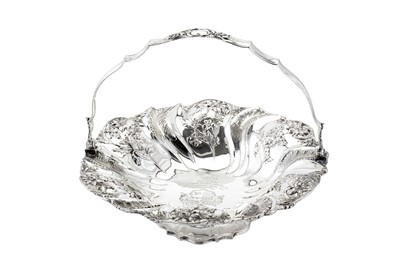 Lot 374 - Welsh interest - A William IV sterling silver cake or bread basket, London 1835 by Joseph Angell I & John Angell I