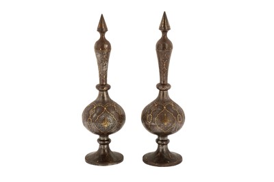 Lot 179 - A PAIR OF QAJAR GOLD-DAMASCENED STEEL BOTTLES