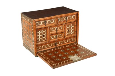 Lot 270 - λ AN HISPANO-MORESQUE IVORY, STAINED WOOD AND SILVER-INLAID WRITING CABINET (VARGUENO)