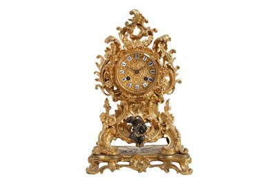Lot 183 - A MID 19TH CENTURY FRENCH GILT BRONZE ROCOCO STYLE MANTEL CLOCK