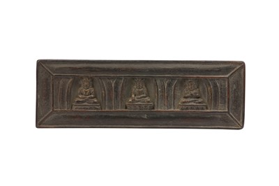 Lot 483 - A TIBETAN GILT-WOOD MANUSCRIPT COVER.