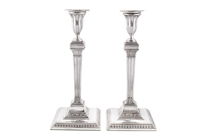Lot 413 - A pair of George III sterling silver candlesticks, London 1781 by Joseph Steward II (reg. March 1768)