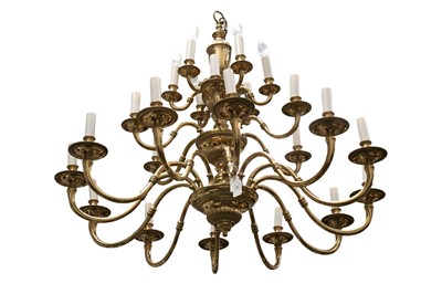 Lot 43 - A PAIR OF LARGE DUTCH STYLE THREE TIER TWENTY FOUR LIGHT BRASS CHANDELIERS