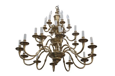 Lot 44 - A BRASS TWENTY FOUR LIGHT THREE TIER CHANDELIER