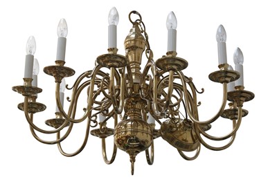 Lot 45 - A DUTCH STYLE BRASS TWELVE LIGHT CHANDELIER
