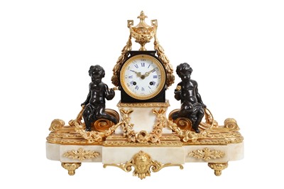Lot 323 - A MID 19TH CENTURY FRENCH GILT AND PATINATED BRONZE MANTEL CLOCK