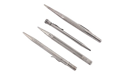 Lot 72 - A group of four silver propelling pencils