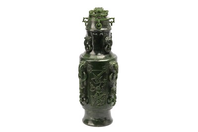 Lot 630 - A LARGE CHINESE SPINACH-GREEN JADE VASE AND COVER.