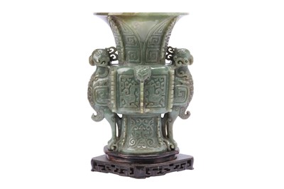 Lot 632 - A LARGE CHINESE CELADON JADE ARCHAISTIC 'PHOENIX' VASE, GU.