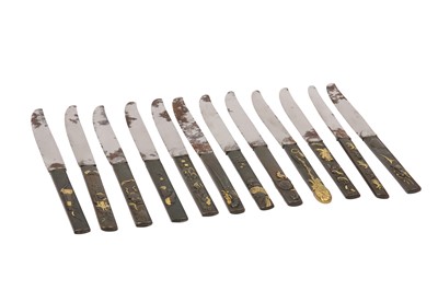 Lot 337 - A SET OF TWELVE KOZUKA HANDLED KNIVES.