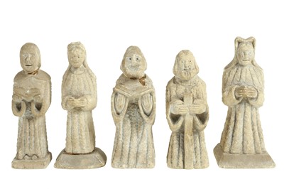 Lot 152 - A GROUP OF FIVE MEDIEVAL STYLE CARVED LIMESTONE FIGURES