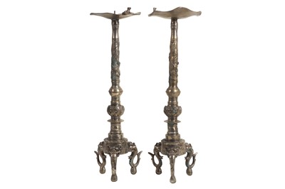 Lot 104 - A PAIR OF 20TH CENTURY SILVERED METAL CHINESE CANDLESTICKS