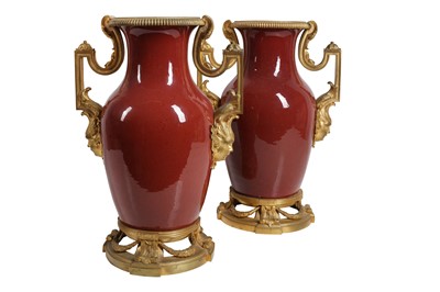 Lot 95 - A PAIR OF LATE  19TH  CENTURY SANG DE BOEUF CHINESE PORCELAIN AND GILT BRONZE MOUNTED VASES
