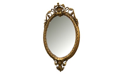 Lot 85 - AN OVAL GILTWOOD AND GESSO MIRROR, IN THE FRENCH TASTE, 20TH CENTURY