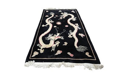 Lot 64 - A CHINESE RECTANGULAR WOOL CARPET, 20TH CENTURY
