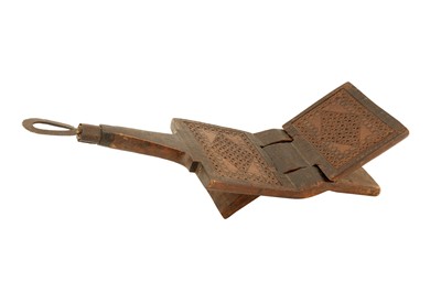 Lot 199 - A FINELY CARVED HARDWOOD COCONUT GRATER