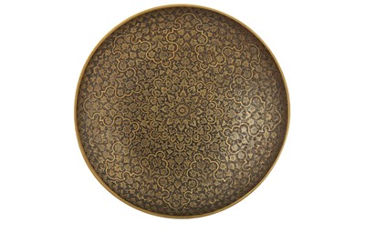 Lot 248 - A BLACK-ENAMELLED BRASS DISH