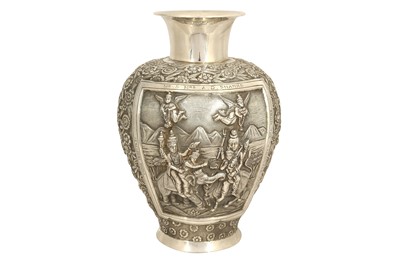 Lot 244 - AN INDIAN SILVER REPOUSSÉ COMMEMORATIVE VASE