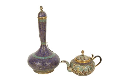 Lot 185 - A GILT COPPER CHAMPLEVÉ ENAMELLED KASHMIRI SURAHI (JUG) AND TEAPOT