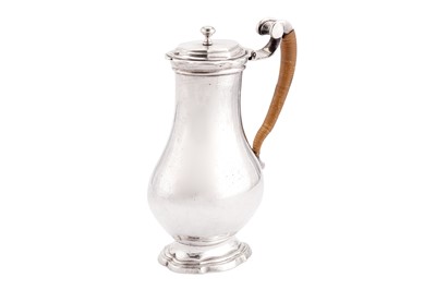 Lot 252 - A George II French plate brass shaving jug, probably London circa 1730