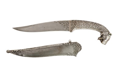 Lot 133 - A SILVER-INLAID LION-HEADED STEEL DAGGER (KHANJAR)