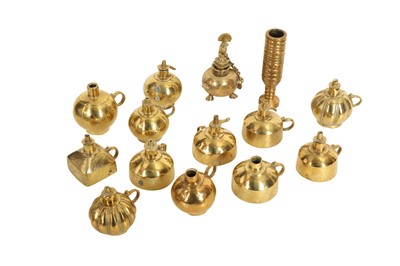 Lot 368 - THIRTEEN BRASS OIL LAMPS AND A TUBULAR BRASS ELEMENT