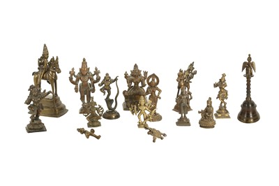 Lot 226 - A GROUP OF FOURTEEN BRONZE DEVOTIONAL MINIATURE ICONS (MURTI) AND A TEMPLE BELL