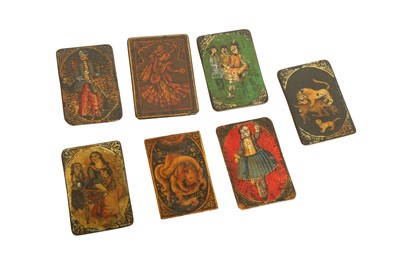 Lot 273 - SEVEN QAJAR LACQUERED PAPIER-MÂCHÉ PLAYING CARDS
