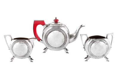 Lot 179 - A mid-20th century Indian Art Deco unmarked silver three-piece tea service, Bombay circa 1950-60