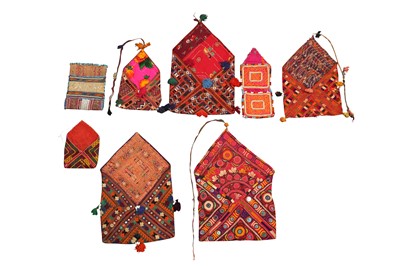 Lot 410 - A COLLECTION OF BALOCH BHUJKI (DOWRY BAGS) AND OTHER TEXTILES