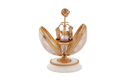 Lot 63 - A late 19th century French gilt metal mounted mother of pearl 'palais royale' sewing necessaire, circa 1880