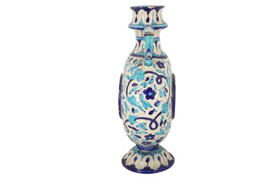 Lot 81 - A MULTAN BLUE AND TURQUOISE POTTERY MOON FLASK