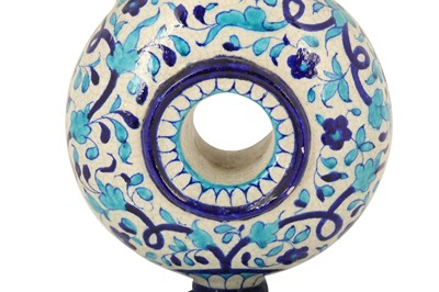Lot 81 - A MULTAN BLUE AND TURQUOISE POTTERY MOON FLASK