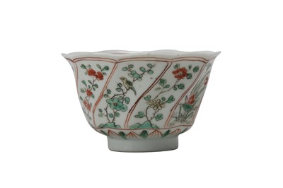 Lot 840 - A CHINESE FAMILLE VERTE TEACUP.